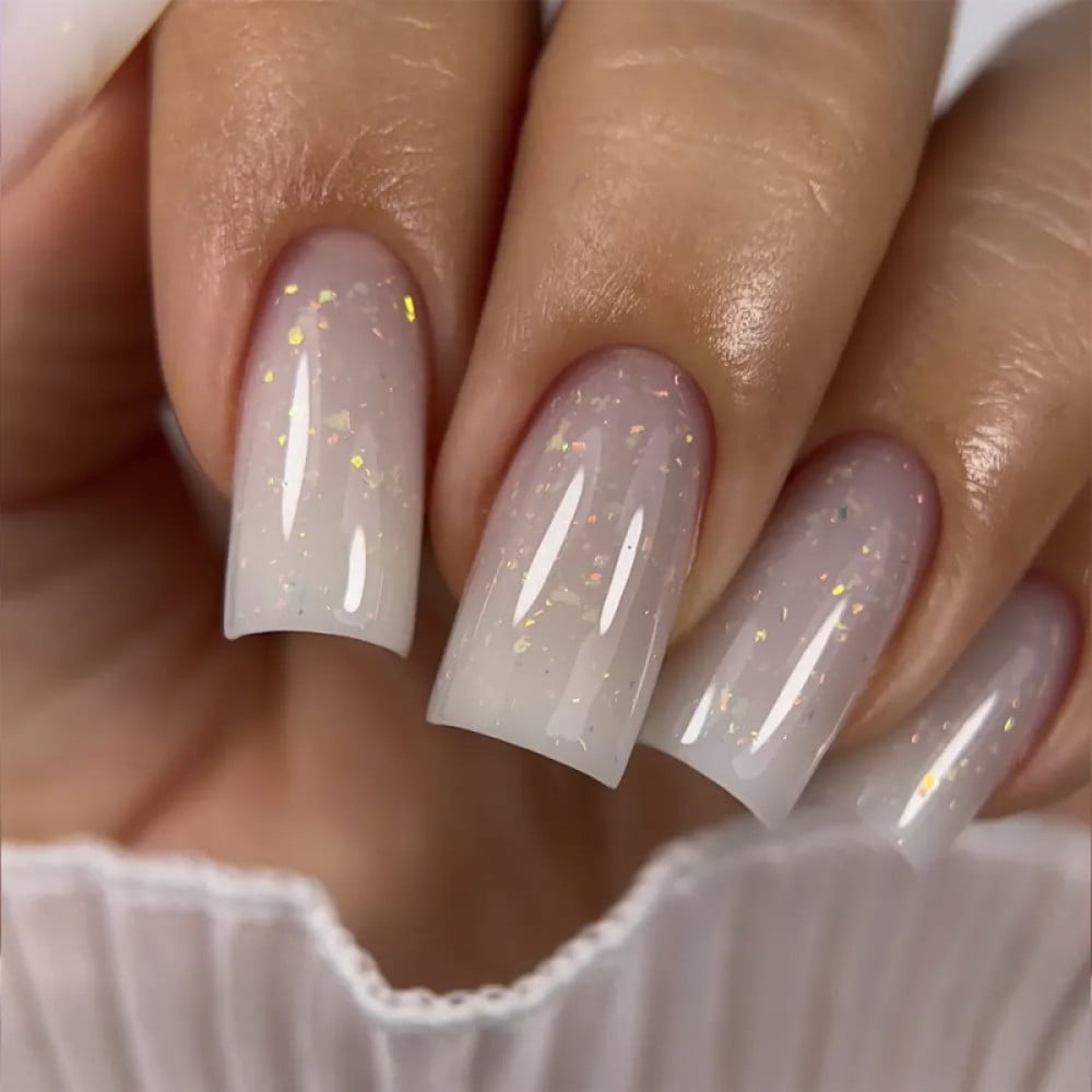 Гель моделюючий JOIA vegan Creamy Builder Gel Iced Cerenity 039 Warm Hoarfrost пильно-бежевий напівпрозорий з золотистою поталлю 1